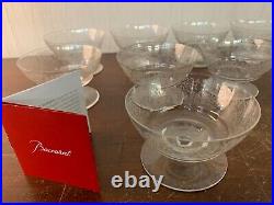 10 coupes à champagne modèle Lully en cristal de Baccarat (prix à la pièce) 10 coupes à champagne modèle Lully en cristal de Baccarat (prix à la pièce)