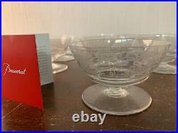 10 coupes à champagne modèle Lully en cristal de Baccarat (prix à la pièce) 10 coupes à champagne modèle Lully en cristal de Baccarat (prix à la pièce)