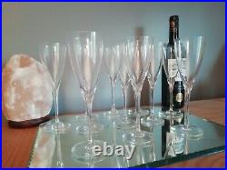 11 verres en cristal estampille Baccarat modèle Don Perignon. H 19cm