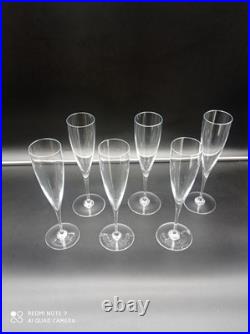 6 flutes à Champagne en Cristal de BACCARAT modèle Dom Pérignon, signé, H 23,5cm