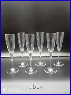 6 flutes à Champagne en Cristal de BACCARAT modèle Dom Pérignon, signé, H 23,5cm
