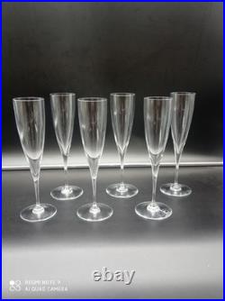 6 flutes à Champagne en Cristal de BACCARAT modèle Dom Pérignon, signé, H 23,5cm
