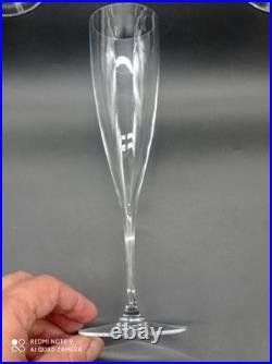 6 flutes à Champagne en Cristal de BACCARAT modèle Dom Pérignon, signé, H 23,5cm