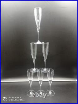 6 flutes à Champagne en Cristal de BACCARAT modèle Dom Pérignon, signé, H 23,5cm