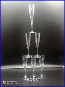 6 flutes à Champagne en Cristal de BACCARAT modèle Dom Pérignon, signé, H 23,5cm