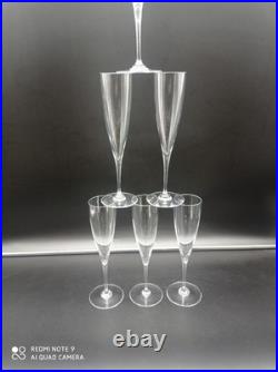 6 flutes à Champagne en Cristal de BACCARAT modèle Dom Pérignon, signé, H 23,5cm