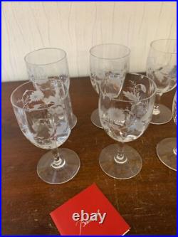 7 verres à vin Montaigne décor gravé en cristal de Baccarat (prix à la pièce) 7 verres à vin Montaigne décor gravé en cristal de Baccarat (prix à la pièce)