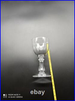 9 verres à vin blanc en cristal de BACCARAT, forme gondole jambe prisme, 12 cm