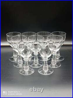 9 verres à vin blanc en cristal de BACCARAT, forme gondole jambe prisme, 12 cm