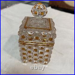 BACCARAT Boîte en cristal à décor de pointes de diamants teinté Orange Signe