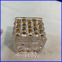 BACCARAT Boîte en cristal à décor de pointes de diamants teinté Orange Signe