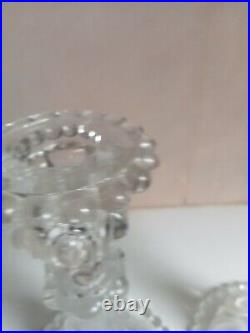 Deux bougeoires en cristal signé baccarat hauteur 22 cm