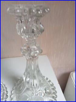 Deux bougeoires en cristal signé baccarat hauteur 22 cm