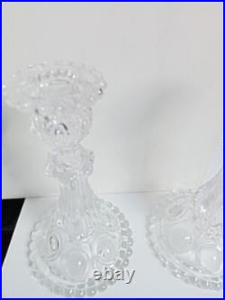 Deux chandeliers en cristal baccarat hauteur 22 cm diamètre 12 cm 1,70 kg