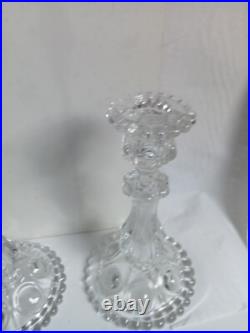 Deux chandeliers en cristal baccarat hauteur 22 cm diamètre 12 cm 1,70 kg