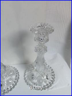 Deux chandeliers en cristal baccarat hauteur 22 cm diamètre 12 cm 1,70 kg