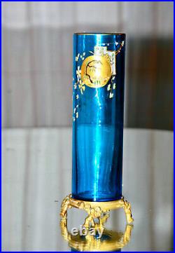 Eugène Rousseau, & BACCARAT. Vase rouleau en cristal bleu émaillé, monté bronze