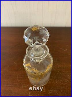 Flacon liseret or en cristal de Baccarat h 17 cm