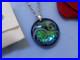 Ortega_a_Baccarat_Pendentif_verre_cristal_bleu_inclusion_de_cercles_metal_01_cgra