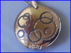 Ortega à Baccarat Pendentif verre cristal bleu & inclusion de cercles métal