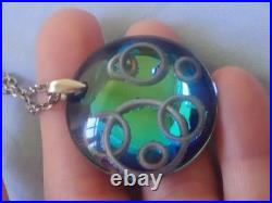 Ortega à Baccarat Pendentif verre cristal bleu & inclusion de cercles métal Ortega à Baccarat Pendentif verre cristal bleu & inclusion de cercles métal