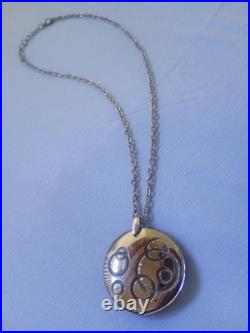 Ortega à Baccarat Pendentif verre cristal bleu & inclusion de cercles métal