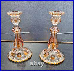 Paire De Bougeoirs En Cristal De Baccarat Couleur Ambre